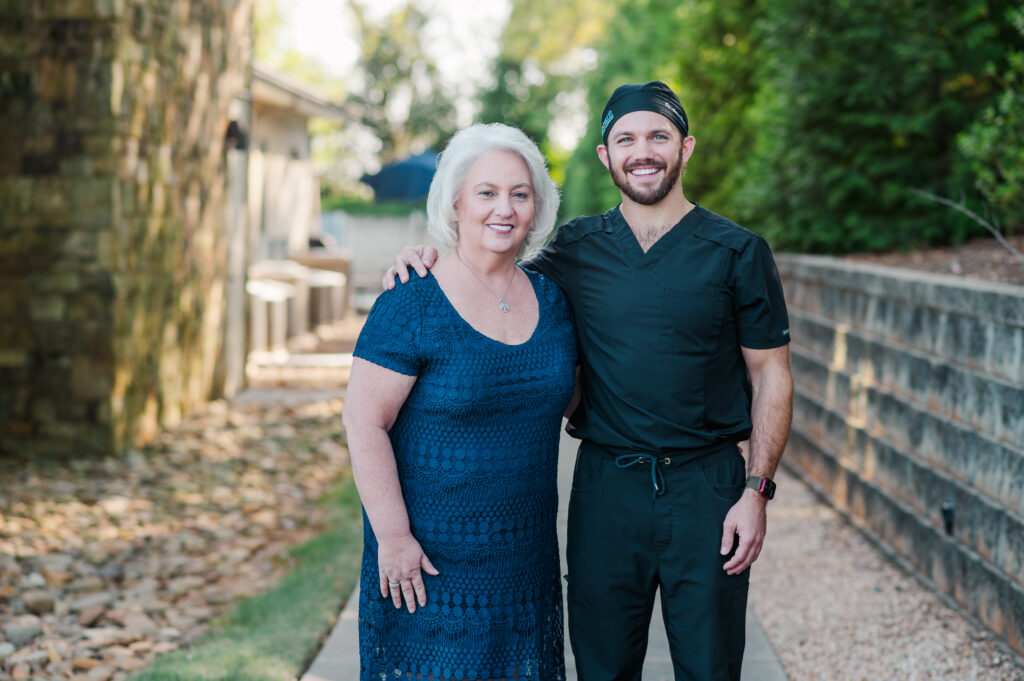 Dr. Henley with happy patient with new smile