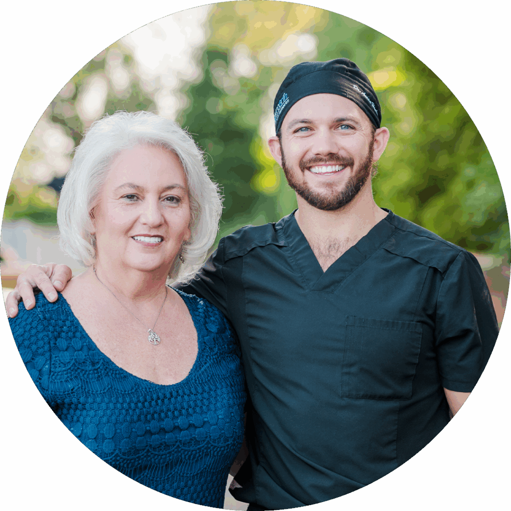 Dr. Henley with successful patient with new all on x / whole-mouth dental implants