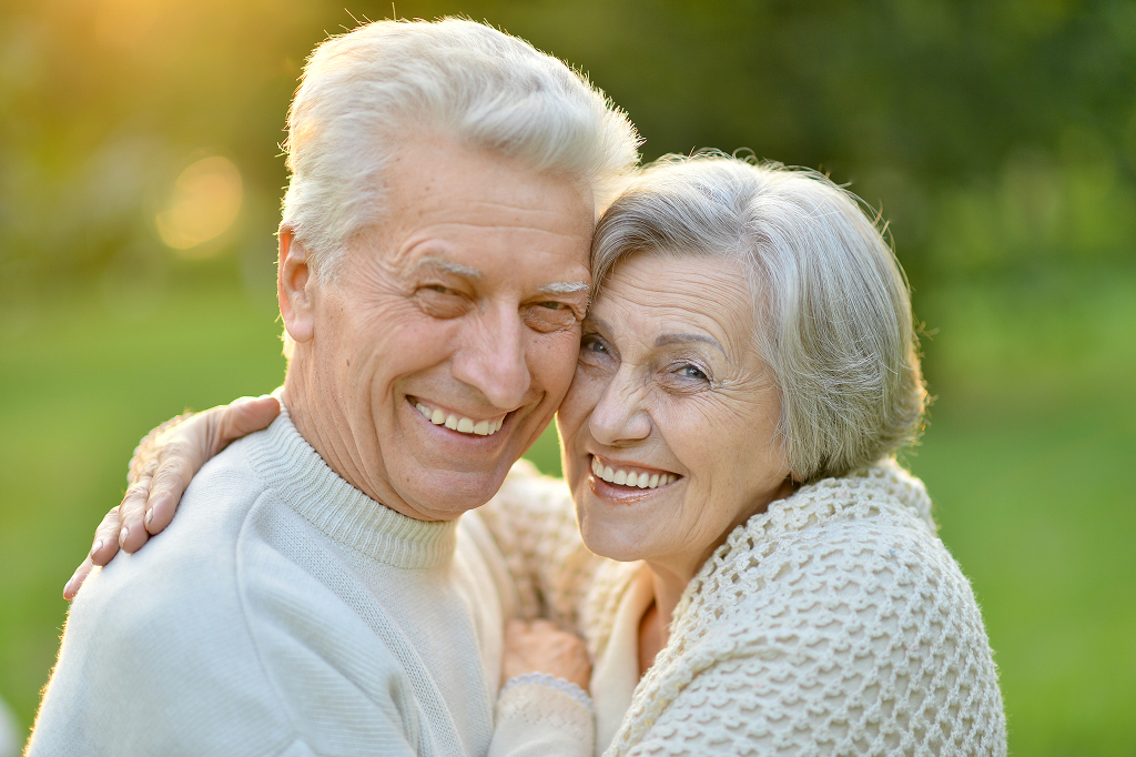 All-on-4 dental implants supporting a full arch of fixed teeth with four strategically placed implants