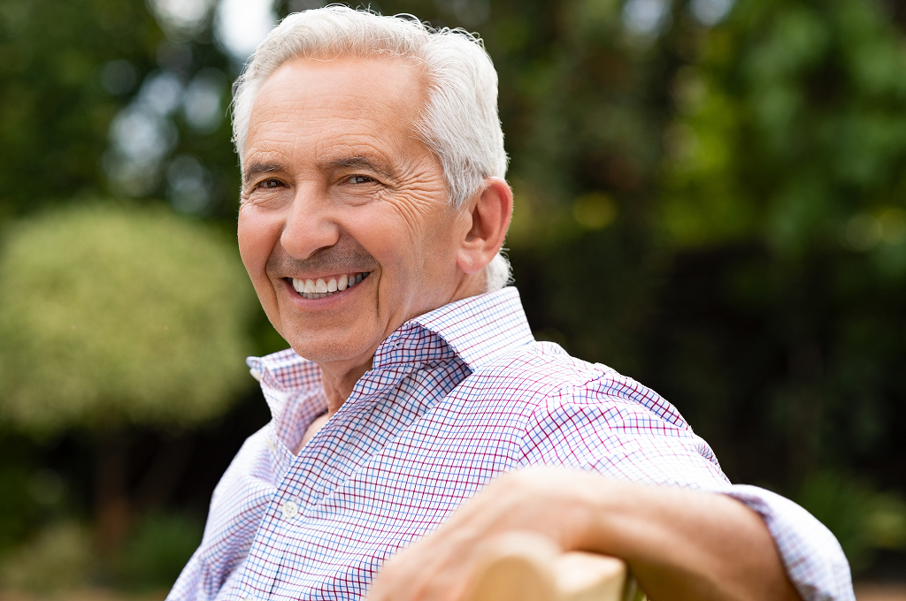 All-on-X dental implants supporting a full arch of fixed teeth with multiple implants customized to the patient's needs